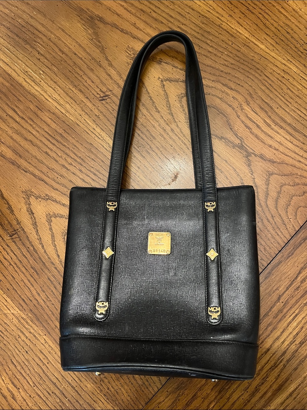 Vintage MCM Black Leather Tote with Gold Logo Plate